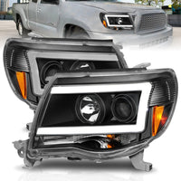 ANZO 05-09 Toyota Tacoma Projector Light Bar Style Headlights w/ C - Lights