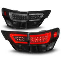 ANZO 11-13 Jeep Grand Cherokee LED Taillights w/ Lightbar Black Housing/Smoke Lens 4pcs - Lights