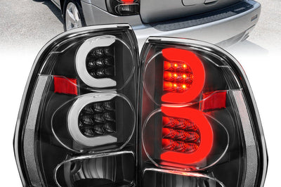 ANZO 2002-2009 Chevrolet Trailblazer LED Tail Lights w/ Light Bar Black Housing Clear Lens