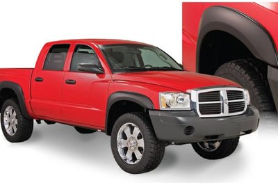 Bushwacker 05-10 Dodge Dakota Crew Cab Fleetside Extend-A-Fender Style Flares 4pc 64.9in Bed - Black - Fender & Trim