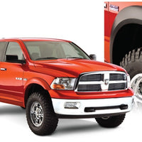 Bushwacker 10-18 Ram 1500 Fleetside Extend-A-Fender Style Flares 4pc 67.4/76.3/96.3in Bed - Black - Fender & Trim