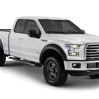 Bushwacker 10-18 Ram 1500 Fleetside Extend-A-Fender Style Flares 4pc 67.4/76.3/96.3in Bed - Black - Fender & Trim