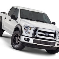 Bushwacker 15-17 Ford F-150 Styleside Pocket Style Flares 4pc 67.1/78.9/97.6in Bed - Black - Fender & Trim