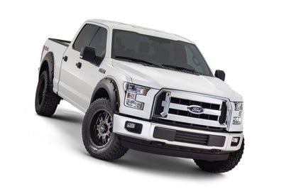 Bushwacker 15-17 Ford F-150 Styleside Pocket Style Flares 4pc 67.1/78.9/97.6in Bed - Black - Fender & Trim