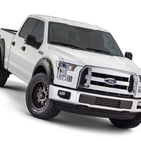 Bushwacker 15-17 Ford F-150 Styleside Pocket Style Flares 4pc 67.1/78.9/97.6in Bed - Black - Fender & Trim