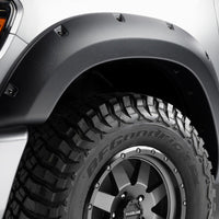 Bushwacker 19-22 Ram 1500 (Excl. Rebel/TRX) 76.3 & 67.4in Bed Forge Style Flares 4pc - Tex. Blk - Fender Trim