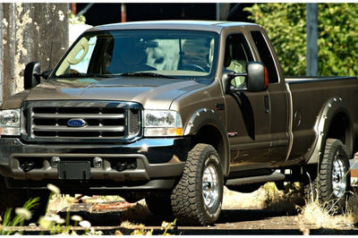 Bushwacker 99-07 Ford F-250 Super Duty Styleside Pocket Style Flares 4pc 81.0/96.0in Bed - Black - Fender & Trim