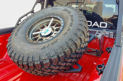 DV8 Offroad 2019 + Jeep Gladiator In-Bed Adjustable Tire Carrier - Roofs & Roof Accessories