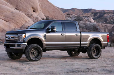 Fabtech 17-21 Ford F250/F350 4WD Gas 4in Rad Arm Sys w/Coils & Perf Shks - Suspension
