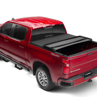 LUND Lund 07-13 Chevy Silverado 1500 (6.5ft. Bed) Genesis Elite Tri-Fold Tonneau Cover - Black - Covers