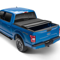 LUND Lund 15-18 Ford F-150 (5.5ft. Bed) Genesis Elite Tri-Fold Tonneau Cover - Black - Covers