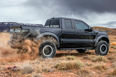 N-Fab Nerf Step 05-14 Nissan Frontier Ext. Cab 4.5ft Bed - Tex. Black - Length - 2in - Bars & Running Boards