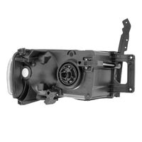 Raxiom 02-05 Dodge RAM 1500 Crystal Headlights- Black Housing (Clear Lens) - Lights