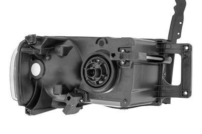 Raxiom 02-05 Dodge RAM 1500 Crystal Headlights- Black Housing (Clear Lens) - Lights