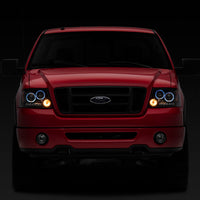 Raxiom 04-08 Ford F-150 Dual LED Halo Projector Headlights- Black Housing (Clear Lens) - Lights