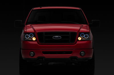 Raxiom 04-08 Ford F-150 Dual LED Halo Projector Headlights- Black Housing (Clear Lens) - Lights