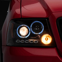 Raxiom 04-08 Ford F-150 Dual LED Halo Projector Headlights- Black Housing (Clear Lens) - Lights