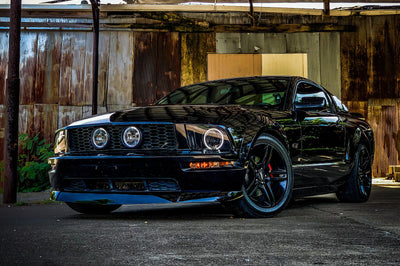 Raxiom 05-09 Ford Mustang GT V6 Axial Series CCFL Halo Projector Headlight- Blk Housing (Smkd Lens) - Lights