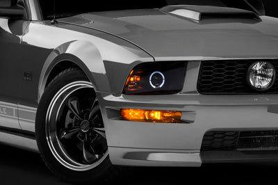 Raxiom 05-09 Ford Mustang Halogen 2010 Style LED Halo Headlights-Blk Hsng(Clear Lens/Excludes GT500) - Lights