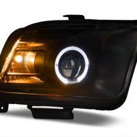 Raxiom 05-09 Ford Mustang Halogen 2010 Style LED Halo Headlights-Blk Hsng(Clear Lens/Excludes GT500) - Lights