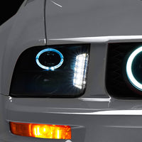 Raxiom 05-09 Ford Mustang w/ Halogen LED Halo Prjctr Headlights-Blk Hsng(Smoked Lens Exclude GT500) - Lights