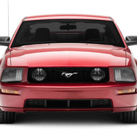 Raxiom 05-09 Ford Mustang w/ Halogen Prjctor Headlights- Black Housing (Clear Lens) (No GT500) Lights