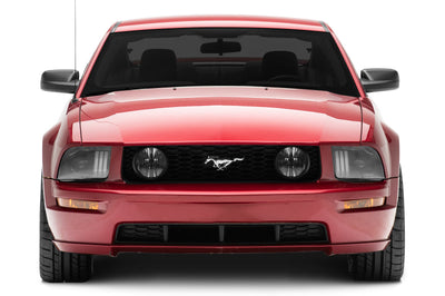 Raxiom 05-09 Ford Mustang w/ Halogen Prjctor Headlights- Black Housing (Clear Lens) (No GT500) Lights