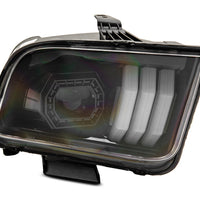 Raxiom 05-09 Ford Mustang w/ Halogen Prjctor Headlights- Black Housing (Clear Lens) (No GT500) Lights