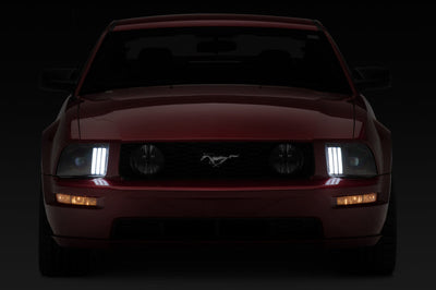 Raxiom 05-09 Ford Mustang w/ Halogen Prjctor Headlights- Black Housing (Clear Lens) (No GT500) Lights