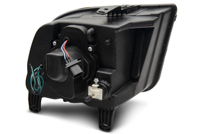 Raxiom 05-09 Ford Mustang w/ Halogen Prjctor Headlights- Black Housing (Clear Lens) (No GT500) Lights