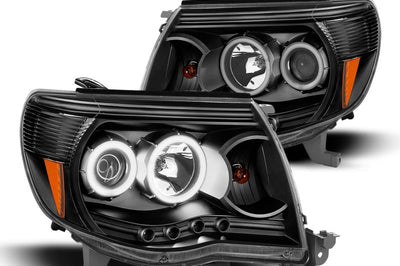 Raxiom 05-09 Tacoma Super White LED Halo Projector Headlights- Black Housing (Clear Lens) - Lights