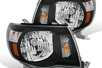 Raxiom 05-09 Toyota Tacoma Headlights- Black Housing (Clear Lens) - Lights