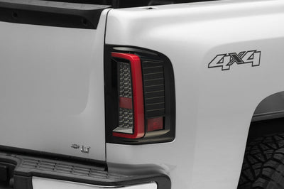Raxiom 07-13 Chevy Silverado 1500 G2 LED Tail Lights- Black Housing (Clear Lens) - Lights