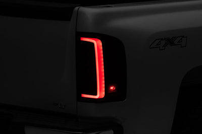 Raxiom 07-13 Chevy Silverado 1500 G2 LED Tail Lights- Black Housing (Clear Lens) - Lights