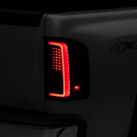 Raxiom 07-13 Chevy Silverado 1500 G2 LED Tail Lights- Black Housing (Clear Lens) - Lights
