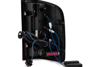 Raxiom 07-13 Chevy Silverado 1500 G2 LED Tail Lights- Black Housing (Clear Lens) - Lights
