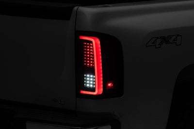 Raxiom 07-13 Chevy Silverado 1500 G2 LED Tail Lights- Black Housing (Clear Lens) - Lights