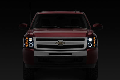 Raxiom 07-13 Silverado 1500 Super White LED Halo Projector Headlights- Black Housing (Clear Lens) - Lights