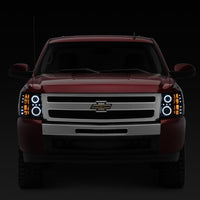 Raxiom 07-13 Silverado 1500 Super White LED Halo Projector Headlights- Black Housing (Clear Lens) - Lights