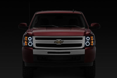 Raxiom 07-13 Silverado 1500 Super White LED Halo Projector Headlights- Black Housing (Clear Lens) - Lights