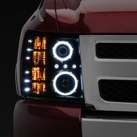 Raxiom 07-13 Silverado 1500 Super White LED Halo Projector Headlights- Black Housing (Clear Lens) - Lights