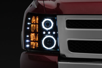 Raxiom 07-13 Silverado 1500 Super White LED Halo Projector Headlights- Black Housing (Clear Lens) - Lights