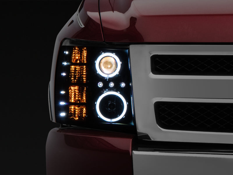 Raxiom 07-13 Silverado 1500 Super White LED Halo Projector Headlights- Black Housing (Clear Lens) - Lights
