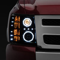 Raxiom 07-13 Silverado 1500 Super White LED Halo Projector Headlights- Black Housing (Clear Lens) - Lights