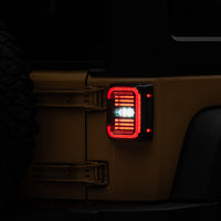 Raxiom 07-18 Jeep Wrangler JK Axial Series LED Halo Tail Lights- Black Housing (Dark Smoked Lens) - Lights