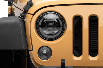 Raxiom 07-18 Jeep Wrangler JK Axial Series LED Headlights- Black Housing (Clear Lens) - Lights