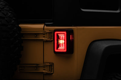 Raxiom 07-18 Jeep Wrangler JK JL Style LED Tail Lights- Black Housing - Red Lens - Lights