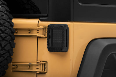 Raxiom 07-18 Jeep Wrangler JK LED Tail Lights- Black Housing (Smoked Lens) - Lights
