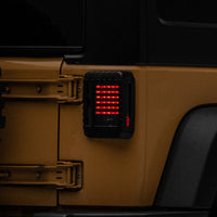 Raxiom 07-18 Jeep Wrangler JK LED Tail Lights- Black Housing (Smoked Lens) - Lights