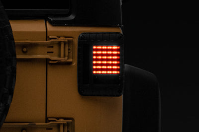 Raxiom 07-18 Jeep Wrangler JK LED Tail Lights- Black Housing (Smoked Lens) - Lights